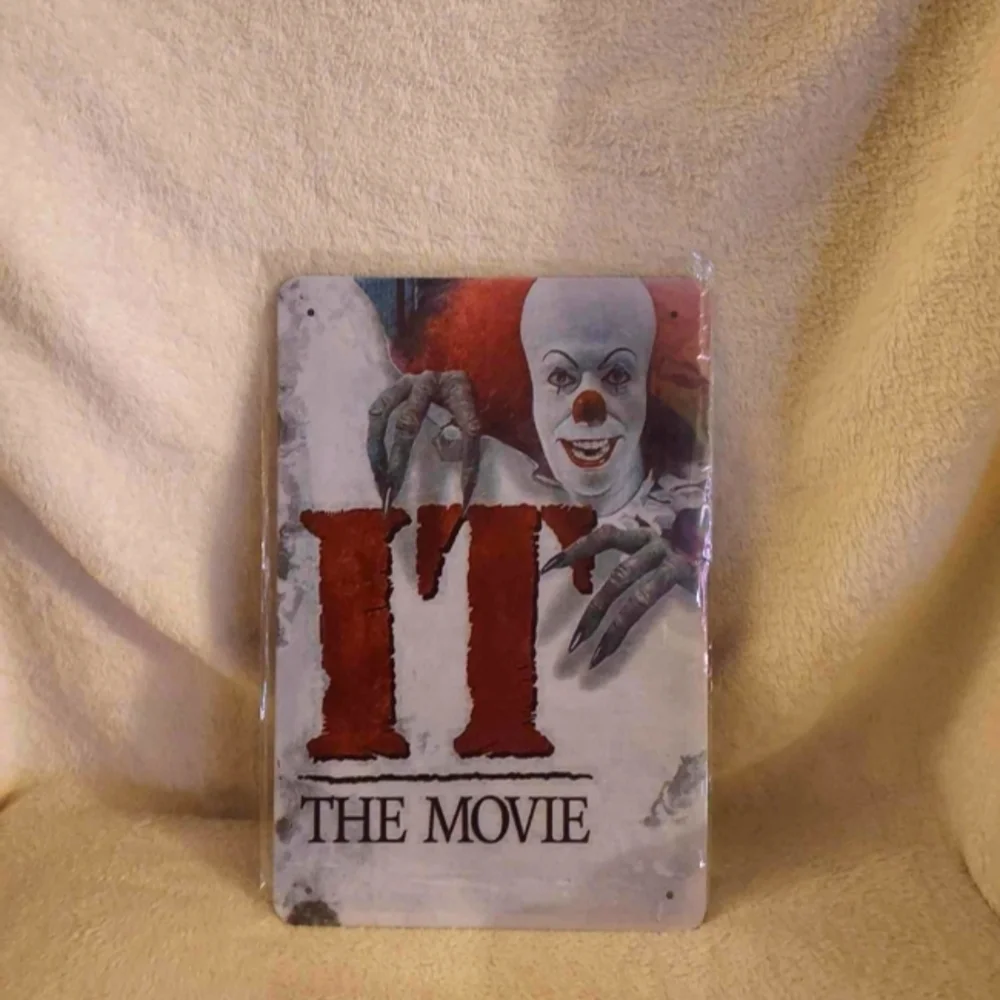 Vintage pennywise tin sign